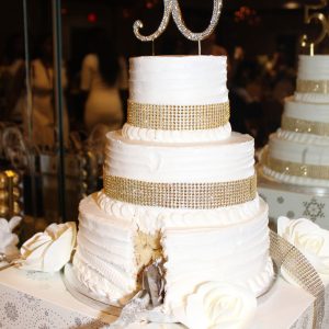 Three-Tier Gold Accent Anniversary Cake